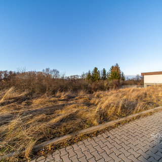 Prodej stavební parcely 900 m² Dobrovíz, Nad Roklí