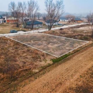 Prodej stavební parcely 864 m² Žáky