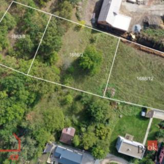 Prodej stavební parcely 3833 m² Beroun