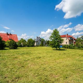 Prodej stavební parcely 1 111 m² Dvory