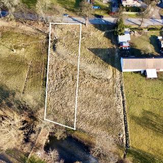 Prodej stavební parcely 1 000 m² Roudná