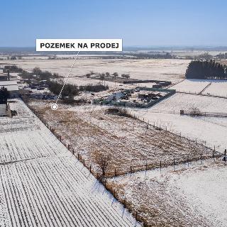 Prodej stavební parcely 991 m² Dřísy