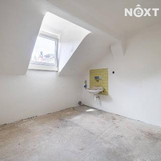 Prodej bytu 1+kk a garsoniéry 14 m² Praha, Husitská