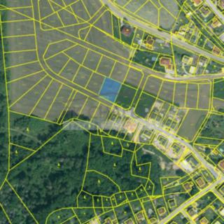 Prodej stavební parcely 986 m² Hosín