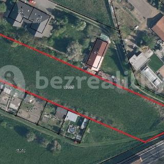 Prodej stavební parcely 3 063 m² Byšice, 