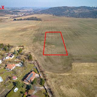 Prodej stavební parcely 7 942 m² Libušín