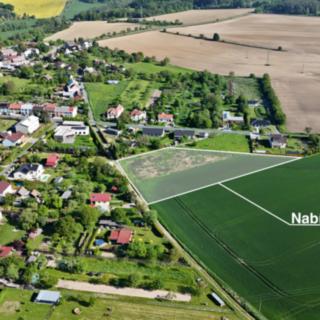 Prodej stavební parcely 6 390 m² Lazníky