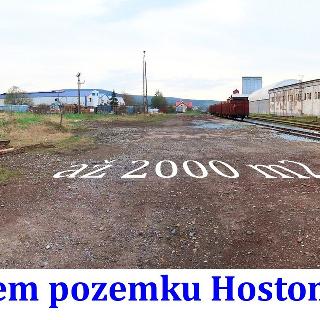 Pronájem komerčního pozemku 2 000 m² Hostomice, Nádražní