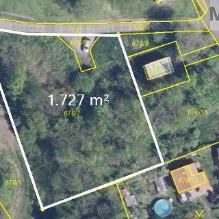 Prodej stavební parcely 1727 m² Dubí