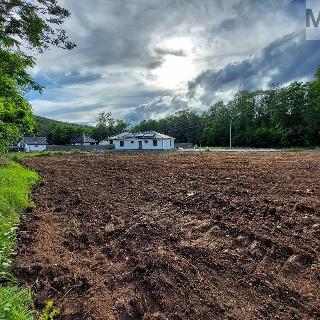 Prodej stavební parcely 1 344 m² Most, Hořanská cesta