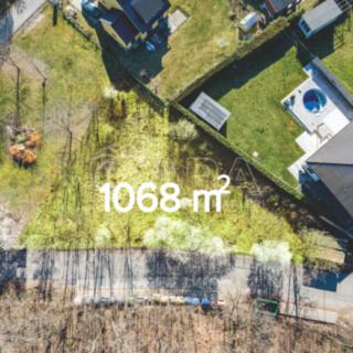 Prodej stavební parcely 1068 m² Zdiby