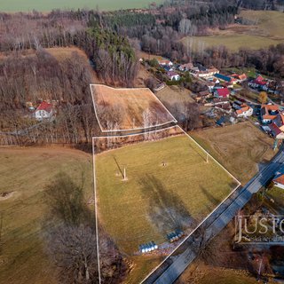 Prodej stavební parcely 5 707 m² Komařice, 