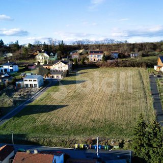 Prodej stavební parcely 1 000 m² Tuchoměřice, Za Kostelem