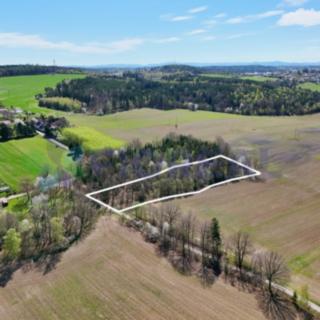 Prodej stavební parcely 6449 m² Libníč