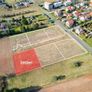 Prodej stavební parcely 1002 m² Lužná