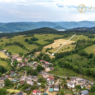 Prodej stavební parcely 1500 m² Domašín