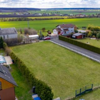 Prodej stavební parcely 1469 m² Charvatce