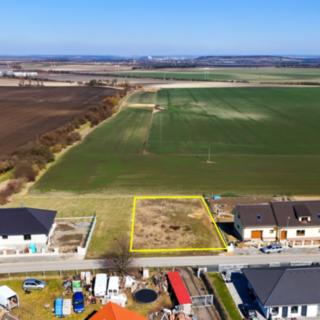 Prodej stavební parcely 1 165 m² Vykáň