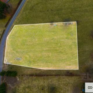 Prodej stavební parcely 1 721 m² Skuhrov, 