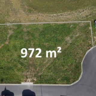 Prodej stavební parcely 972 m² Charvatce