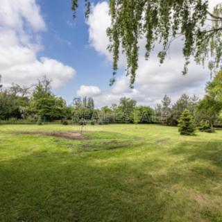Prodej stavební parcely 1807 m² Mezouň