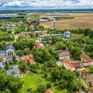 Prodej stavební parcely 1 039 m² Tuchoměřice, 