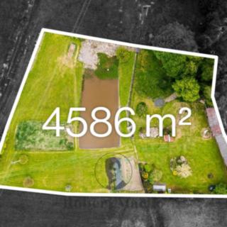 Prodej stavební parcely 4586 m² Bernartice