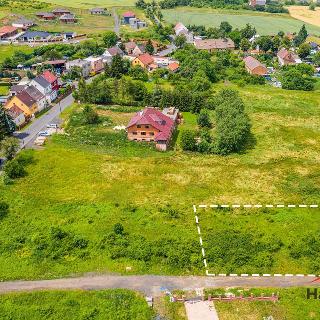 Prodej stavební parcely 1 060 m² Modlany