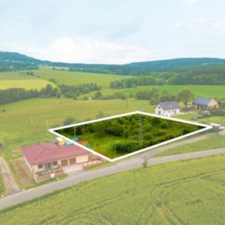 Prodej stavební parcely 4052 m² Komárov