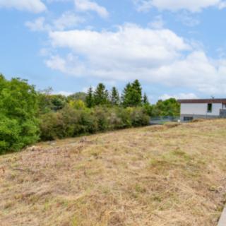 Prodej stavební parcely 900 m² Dobrovíz, Nad Roklí