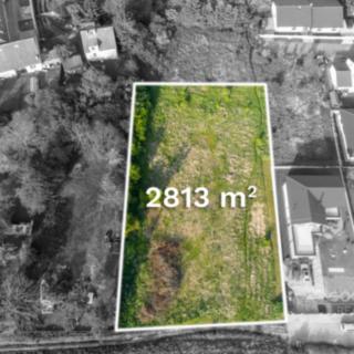 Prodej stavební parcely 2813 m² Dobříč