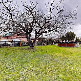 Prodej stavební parcely 580 m² Horoušany