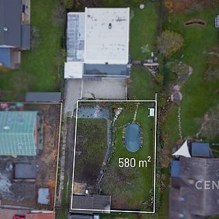 Prodej stavební parcely 580 m² Horoušany