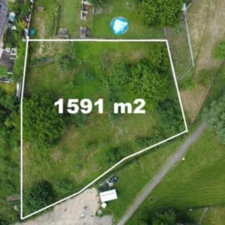 Prodej stavební parcely 1591 m² Jeníkovice