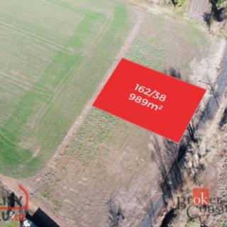 Prodej stavební parcely 989 m² Zbrašín Hořany