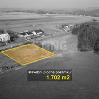 Prodej stavební parcely 1 702 m² Vojkovice