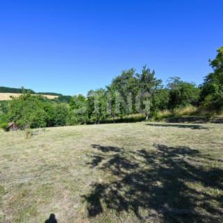 Prodej stavební parcely 1 333 m² Podhradí