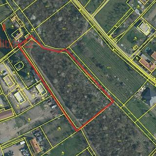 Prodej stavební parcely 7 065 m² Kly