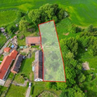 Prodej stavební parcely 2 302 m² Zahrádka