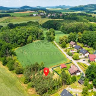 Prodej stavební parcely 1 633 m² Doksy