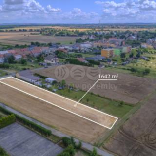 Prodej stavební parcely 1 642 m² Záříčí