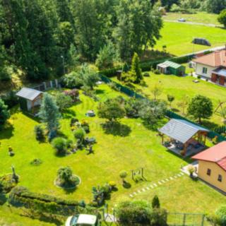 Prodej stavební parcely 1 441 m² Okna