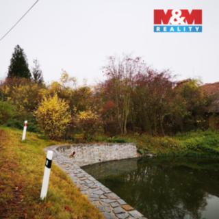 Prodej zahrady 611 m² Měcholupy
