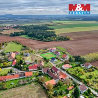 Prodej stavební parcely 900 m² Milostín