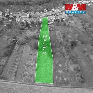 Prodej stavební parcely 3 385 m² Milešovice