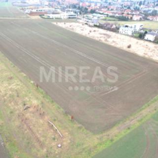 Prodej stavební parcely 5 650 m² Praha Kolovraty