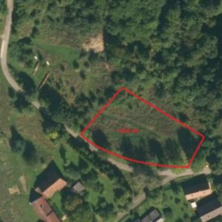 Prodej stavební parcely 1 694 m² Podhradí