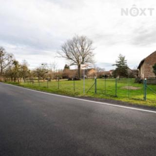 Prodej stavební parcely 968 m² Suchdol