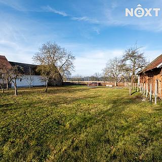 Prodej stavební parcely 1 882 m² Nové Mitrovice
