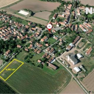 Prodej stavební parcely 4 087 m² Milostín